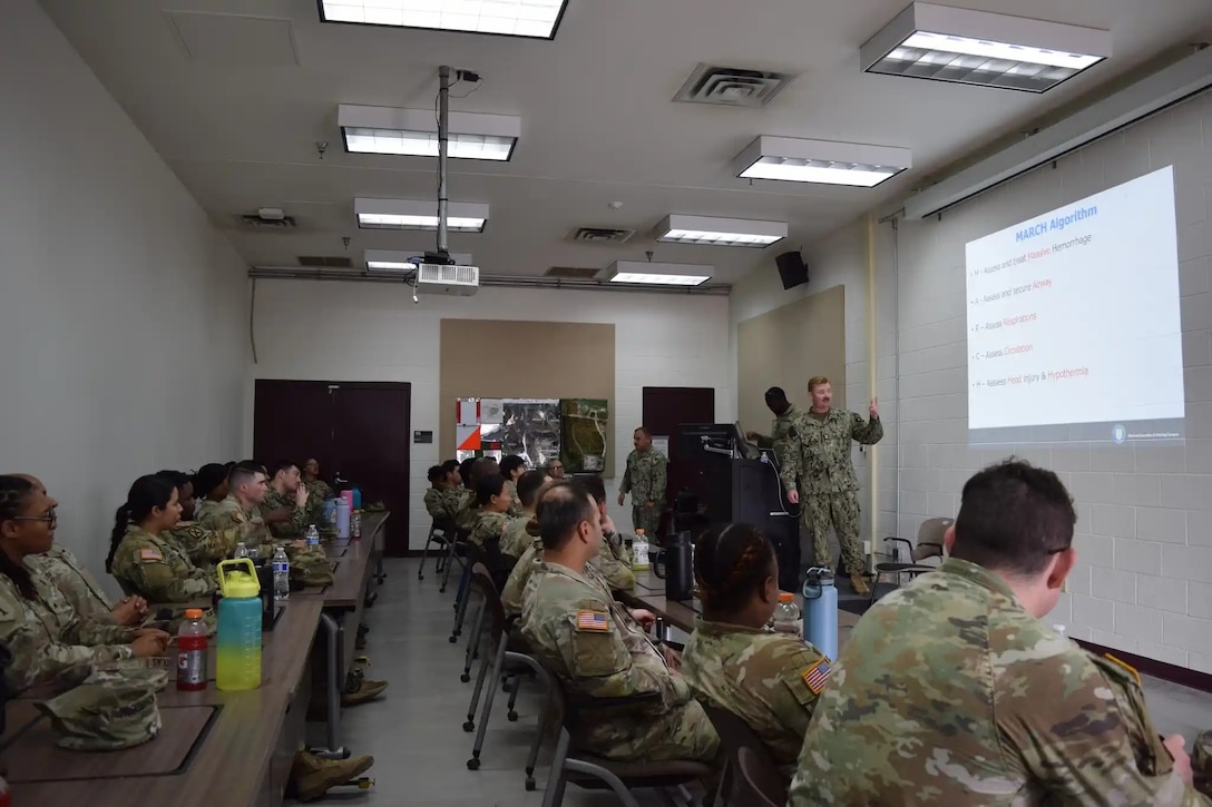 Army and Navy students in the Medical Education and Training Campus Respiratory Therapist course conduct a Joint Field Training Exercise on Joint Base San Antonio-Camp Bullis, Texas. In a classroom setting, students are taught the MARCH algorithm (Massive Hemorrhage, Airway, Respirations, Circulation, and Head/Hypothermia) to rapidly assess and stabilize simulated casualties.