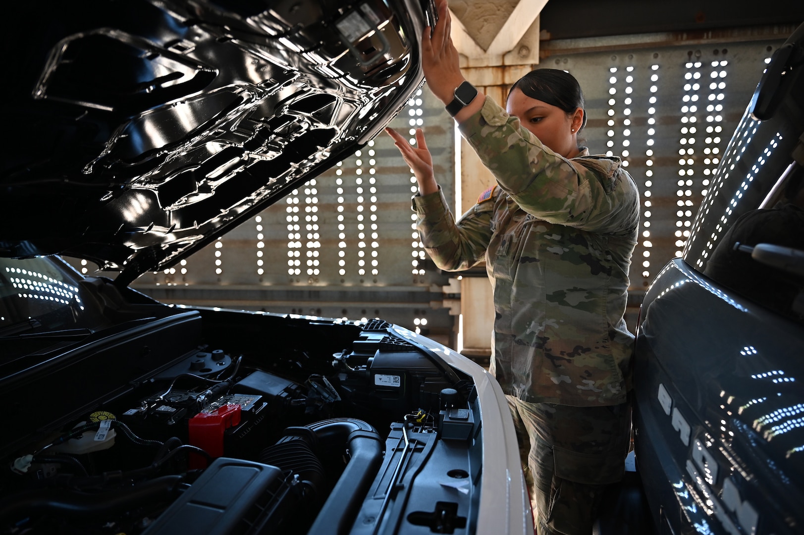 A U.S. Soldier with the Arizona Army National Guard inspects a vehicle within a rail car entering the U.S. at the Dennis DeConcini Port of Entry in Nogales, Arizona, April 30, 2025.