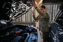 A U.S. Soldier with the Arizona Army National Guard inspects a vehicle within a rail car entering the U.S. at the Dennis DeConcini Port of Entry in Nogales, Arizona, April 30, 2025.
