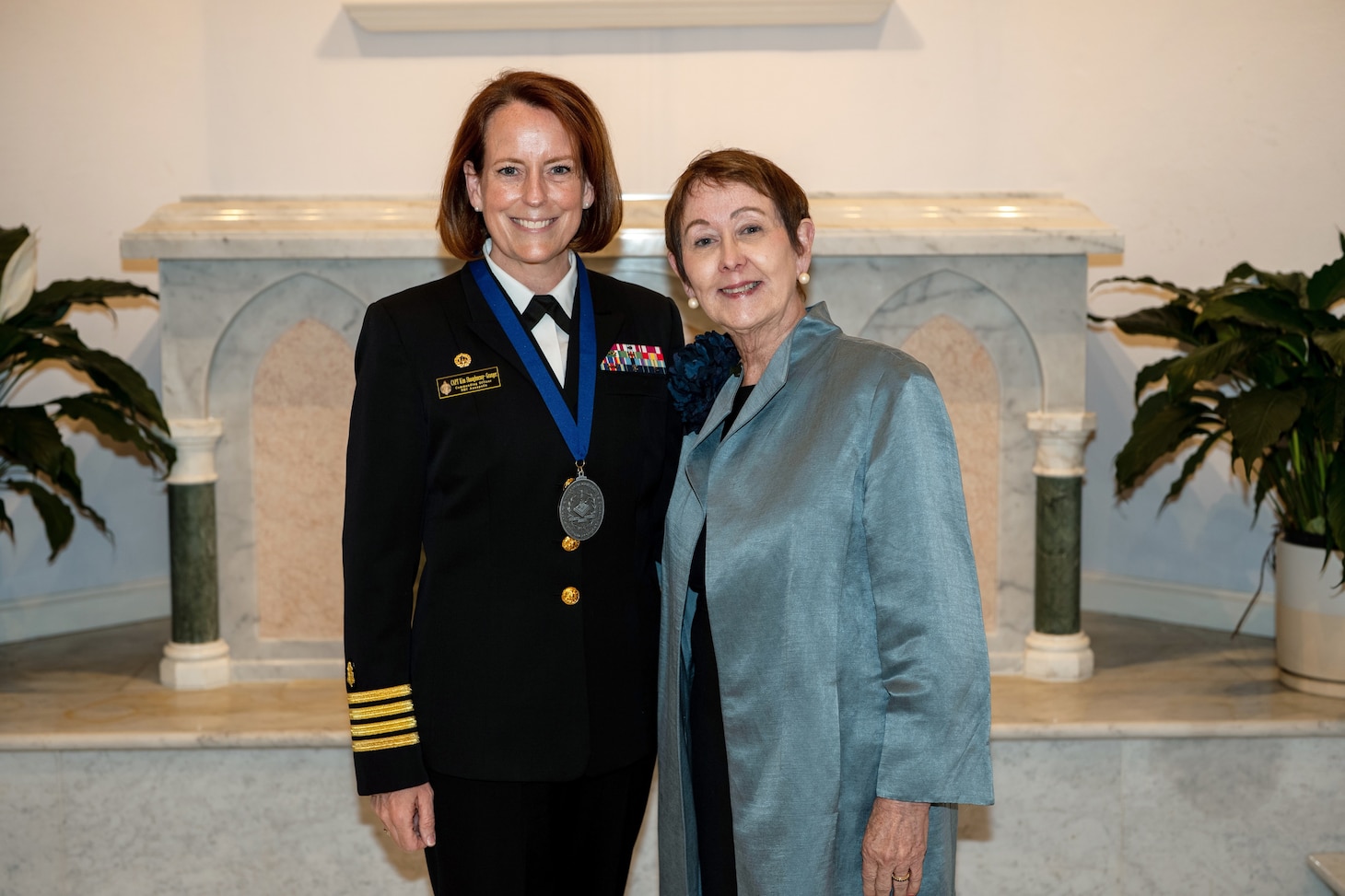 U.S. Navy Capt. Kim P. Shaughnessy-Granger, director of Naval Health Clinic Annapolis and Commanding Officer of Navy Medicine Readiness and Training Command Annapolis stands with Donna S. Havens, PhD, RN, FAAN, Connelly Endowed Dean and Professor, M. Louise Fitzpatrick College of Nursing, Villanova University after receiving the Villanova University M. Louise Fitzpatrick College of Nursing’s Distinguished Leadership in Nursing Practice award. (Photo courtesy of John Welsh, Rare Light Media)