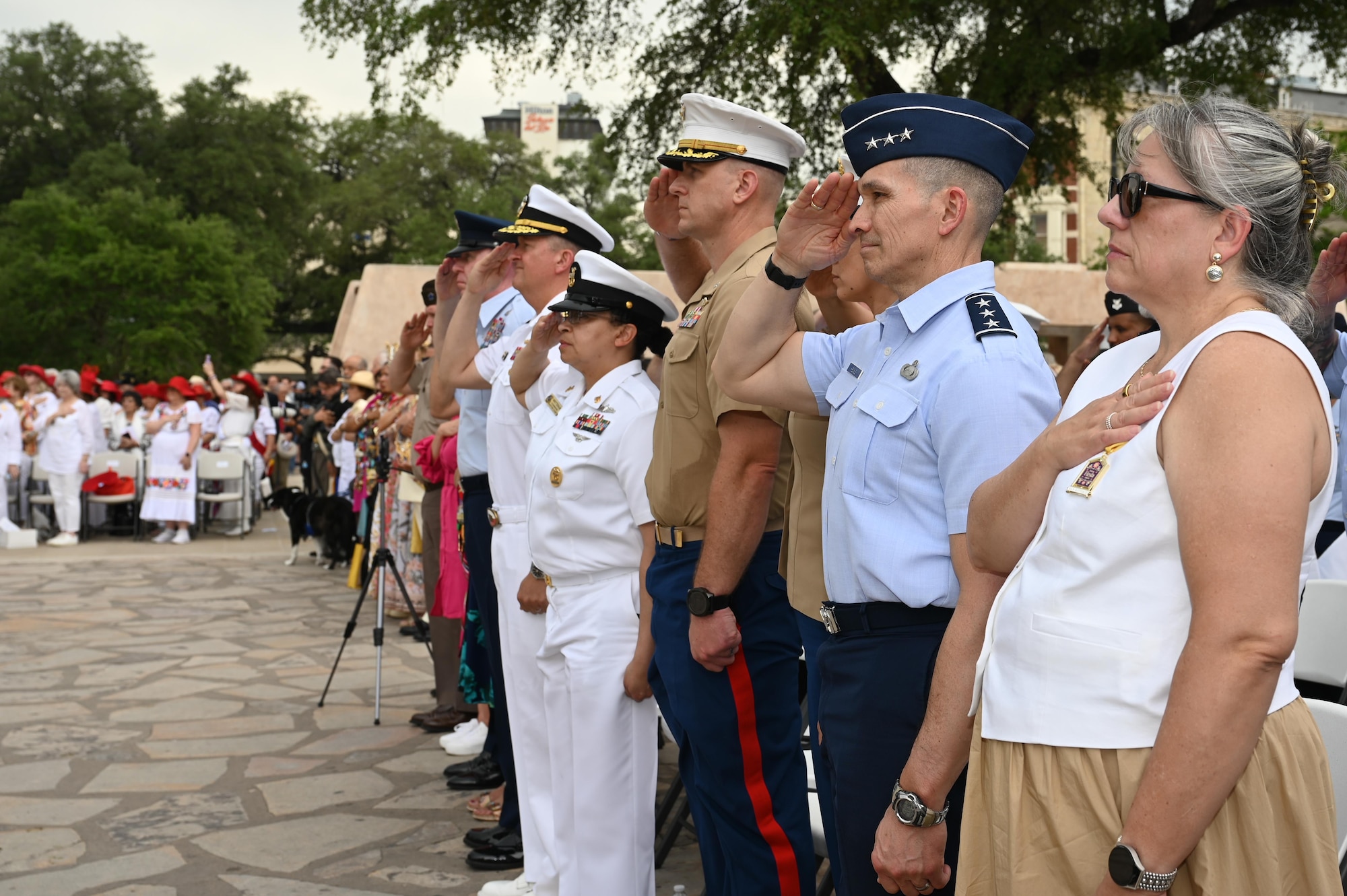 Military leadership salute during the Pilgrimage to the Alamo event.