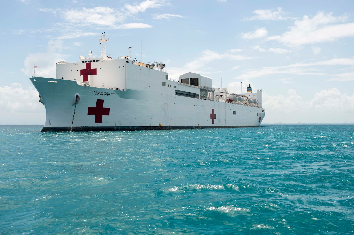 The Military Sealift Command hospital ship USNS Comfort (T-AH 20) sit at anchor during Continuing Promise 2015. Continuing Promise is a U.S. Southern Command-sponsored and U.S. Naval Forces Southern Command/U.S. 4th Fleet-conducted deployment to conduct civil-military operations including humanitarian-civil assistance, subject matter expert exchanges, medical, dental, veterinary and engineering support and disaster response to partner nations and to show U.S. support and commitment to Central and South America and the Caribbean. (U.S. Navy photo by Mass Communication Specialist 1st Class Gary Johnson/Released)