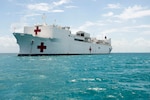 The Military Sealift Command hospital ship USNS Comfort (T-AH 20) sit at anchor during Continuing Promise 2015. Continuing Promise is a U.S. Southern Command-sponsored and U.S. Naval Forces Southern Command/U.S. 4th Fleet-conducted deployment to conduct civil-military operations including humanitarian-civil assistance, subject matter expert exchanges, medical, dental, veterinary and engineering support and disaster response to partner nations and to show U.S. support and commitment to Central and South America and the Caribbean. (U.S. Navy photo by Mass Communication Specialist 1st Class Gary Johnson/Released)