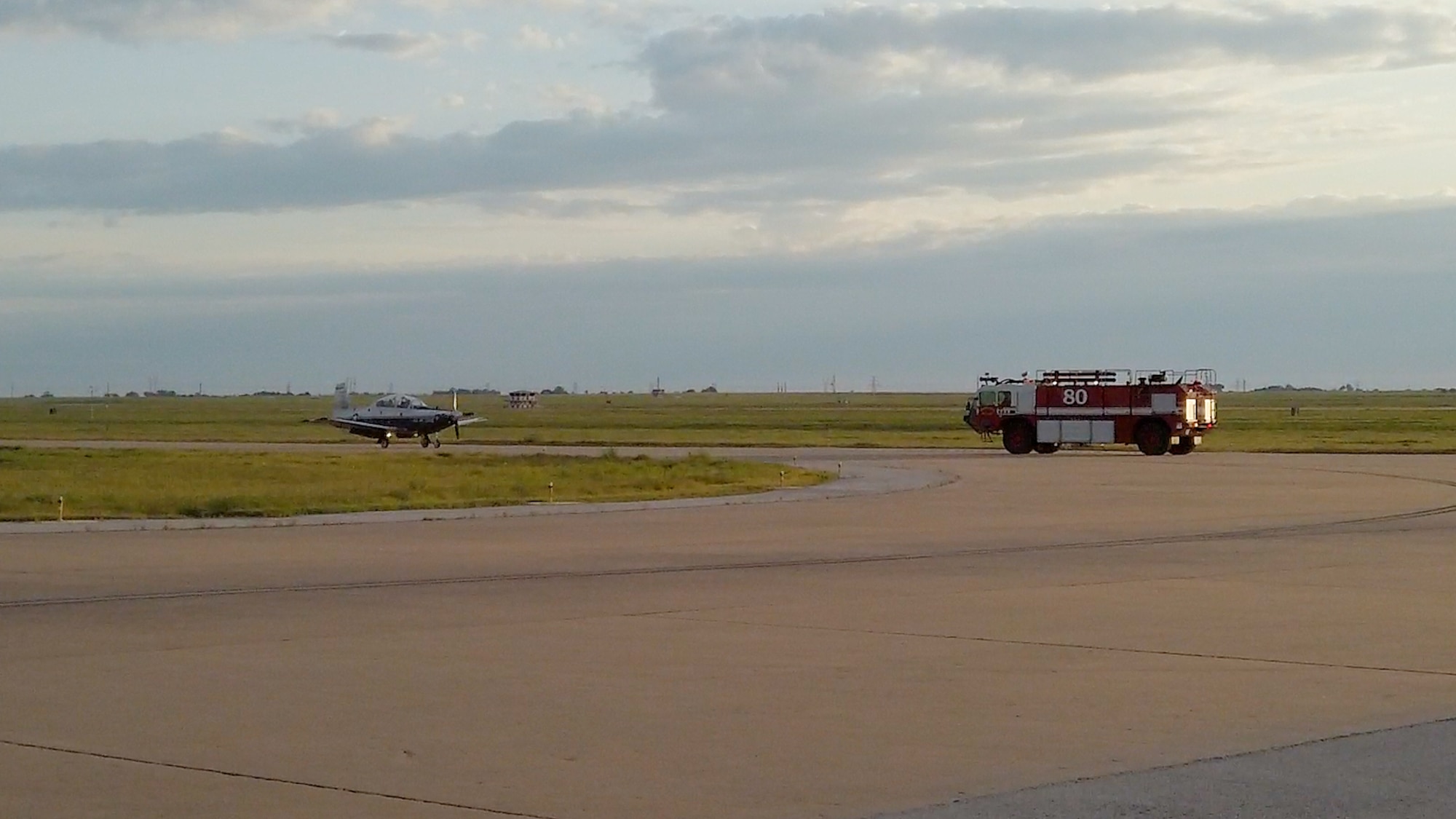 A T-6 Texan II aircraft successfully lands on taxiway Delta