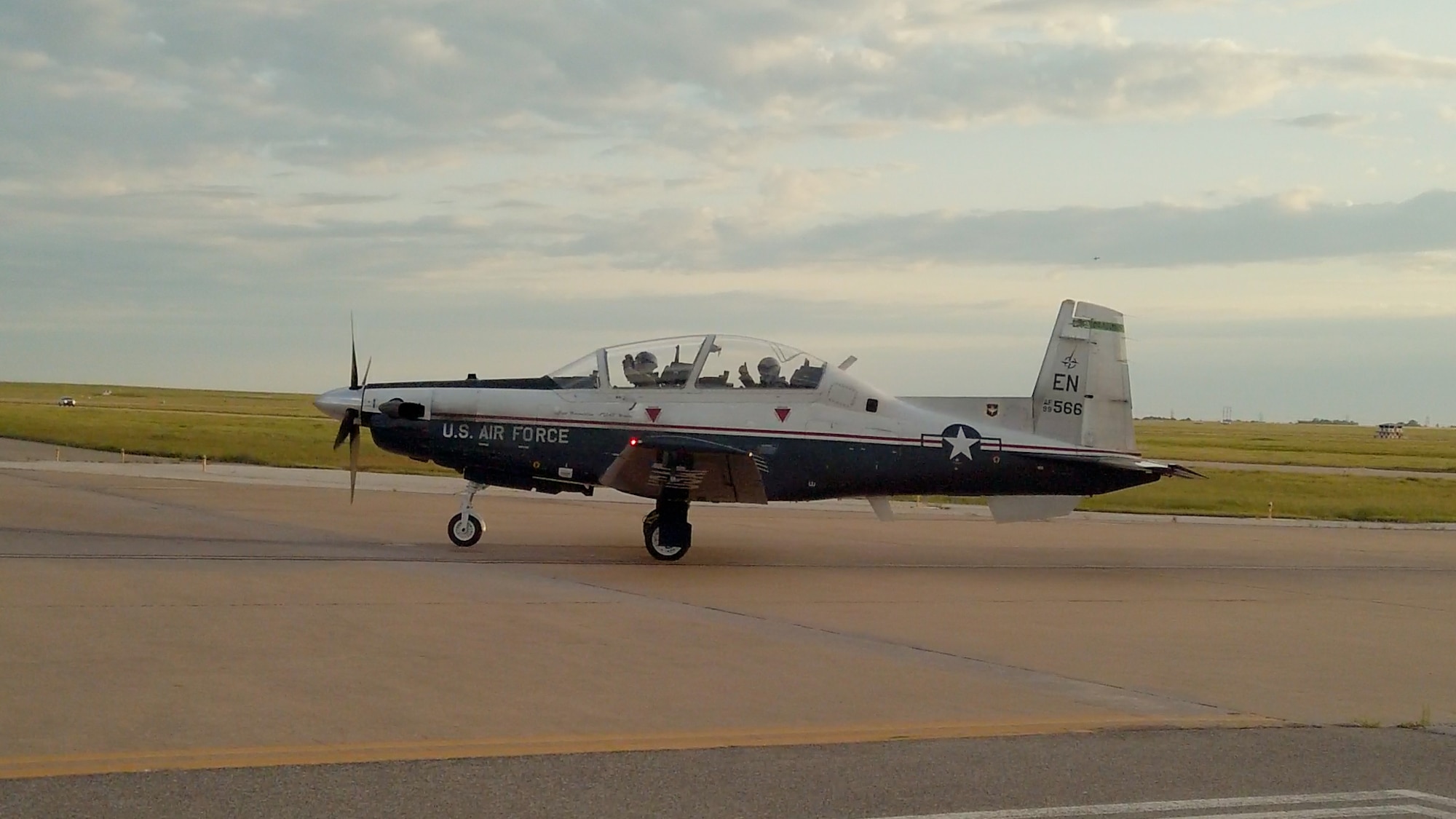 A T-6 Texan II aircraft successfully lands on taxiway Delta