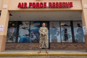 Master Sgt. Michael Arriaga, 919th Special Operations Wing, recruiter, poses for a photo in front of the Air Force Reserve Recruiting Office in Mary Ester, FL. There are over 200 career opportunities within the Air Force Reserve.