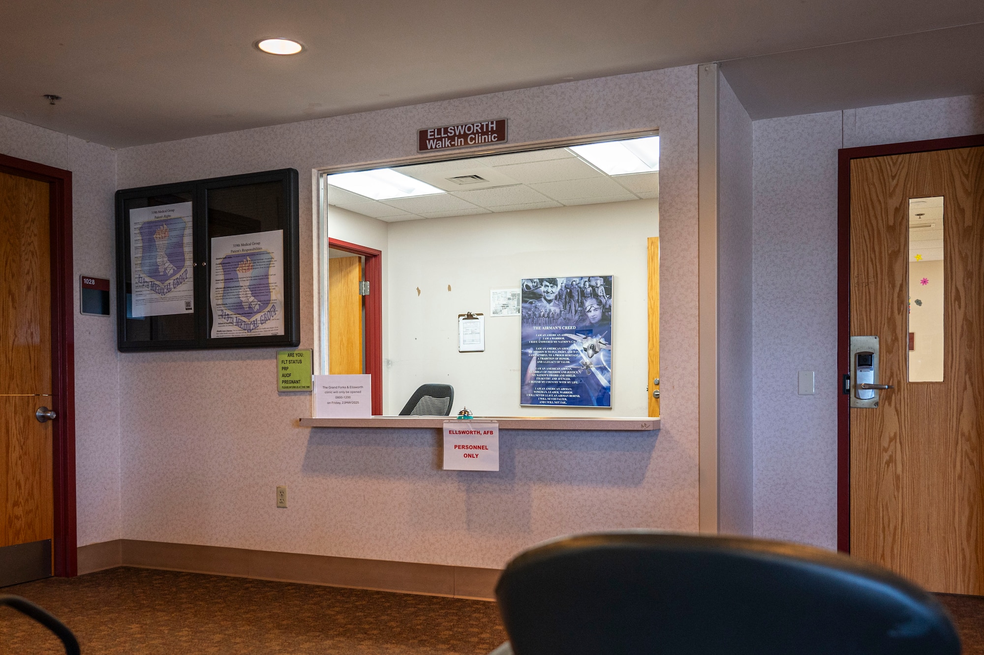 The 28th Bomb Wing Flight Medicine desk is situated adjacent to the 319th Medical Group Flight Medicine desk at Grand Forks Air Force Base, N.D., May 6, 2025. To mitigate any resource and equipment limitations the 28th MDG and the 319 MDG worked together to deconflict requirements and maximize current resource levels to sustain the top level of care for all patients. (U.S. Air Force photo by Airman 1st Class Emma Funderburk)