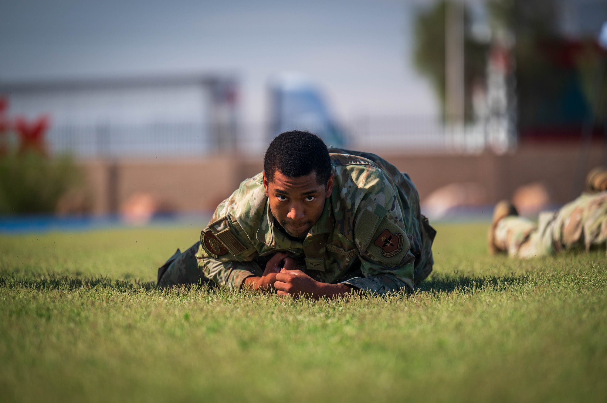 U.S. Air Force Airman 1st Class Jren Jordan, 56th Security Forces Squadron defender, high crawls during the 2025 Police Week Defender Challenge, May 13, 2025, at Luke Air Force Base, Arizona.