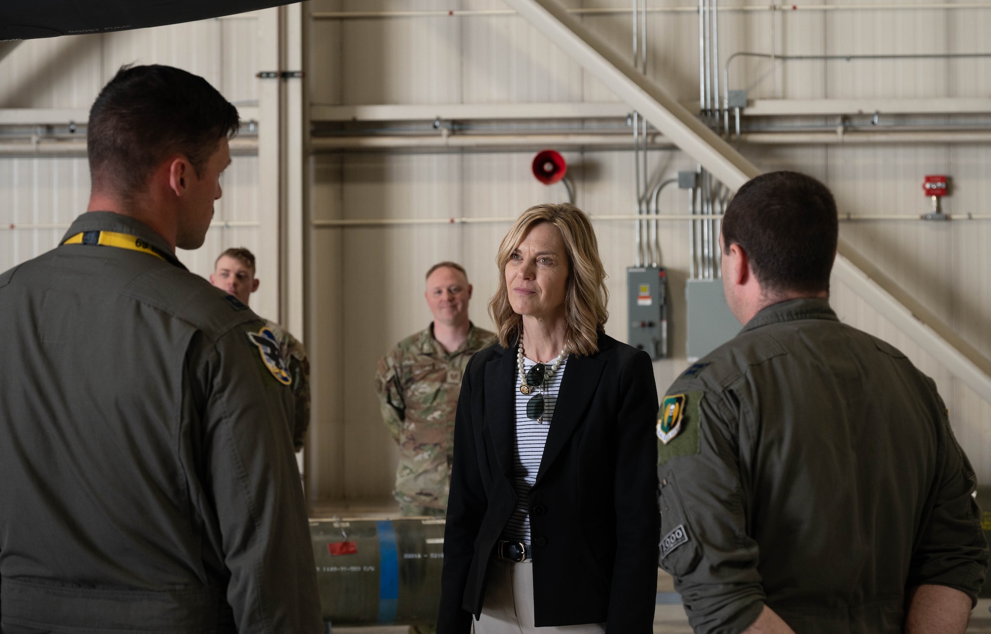 U.S. Air Force Capt. Daniel Hunt (left), a 69th Bomb Squadron weapon systems officer, and U.S. Air Force Capt. Britton Blake, a 69th Bomb Squadron B-52H Stratofortress pilot, explain their roles and responsibilities in the aircraft to Rep. Julie Fedorchak at Minot Air Force Base, North Dakota, May 5, 2025. Fedorchak was sworn into the United States House of Representatives in January, 2025. (U.S. Air Force photo by Airman 1st Class Wesley Davies)