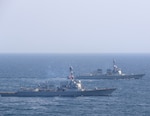 AT SEA (May, 8, 2025) - The Arleigh Burke-class guided-missile destroyer USS William P. Lawrence (DDG 110), left, and the Sejong the Great-class destroyer ROKS Yulgok Yi-I (DDG-992), right, sail together during Maritime Counter Special Operations Exercise (MCSOFEX) May, 8, 2025. MCSOFEX is a high-profile exercise focused on readiness and shaping the maritime domain to achieve both U.S. and the Republic of Korea cooperation objectives. William P. Lawrence is deployed and assigned to Destroyer Squadron (DESRON) 15, the Navy’s largest DESRON and the U.S. 7th Fleet’s principal surface force. (U.S. Navy photo by Naval Aircrewman Tactical Helicopter 3rd Class Seth Evans)