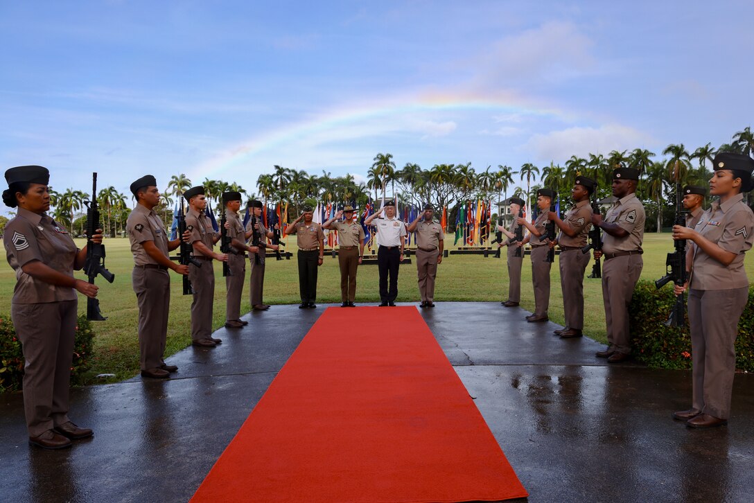 Senior land force leaders from the United States, Japan, Australia, and the U.S. Marine Corps salute during an official welcome ceremony at Historic Palm Circle, Fort Shafter, Hawaii, May 12, 2025.