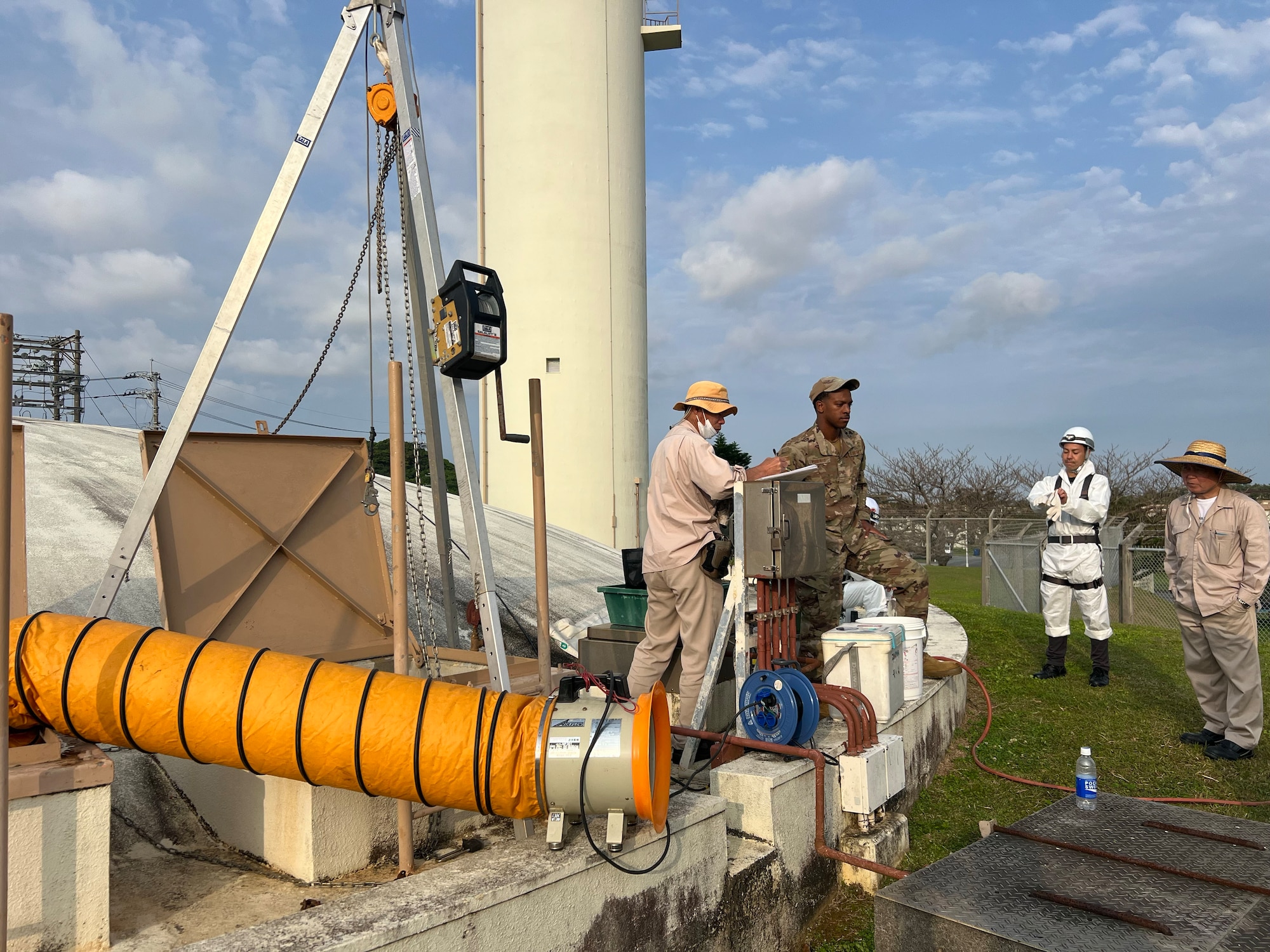 Members of the 18th Civil Engineer Squadron’s Water and Fuels System Maintenance Operations team repair a water line