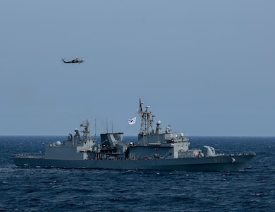 AT SEA (May, 8, 2025) - The first-in-class destroyer ROKS Gwangaeto the Great (DDH 971) and MH-60R Seahawk assigned to the "Blue Hawks" of Helicopter Maritime Strike Squadron (HSM) 78 operate together during Maritime Counter Special Operations Exercise (MCSOFEX) May, 8, 2025. MCSOFEX is a high-profile exercise focused on readiness and shaping the maritime domain to achieve both U.S. and the Republic of Korea cooperation objectives. William P. Lawrence is deployed and assigned to Destroyer Squadron (DESRON) 15, the Navy’s largest DESRON and the U.S. 7th Fleet’s principal surface force. (U.S. Navy photo by Mass Communication Specialist 3rd Class Gavin Arnoldhendershot)
