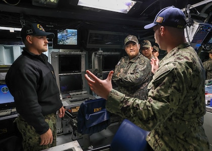 DONGHAE, Republic of Korea (May 7, 2025) - Republic of Korea (ROK) Army service members receive a tour of the combat information center aboard the Arleigh Burke-class guided-missile destroyer USS William P. Lawrence (DDG 110) during the in-port period of Maritime Counter Special Operations Exercise (MCSOFEX), May 7, 2025. MCSOFEX is a high profile exercise focused on readiness and shaping the maritime domain to achieve both U.S. and ROK cooperation objectives. William P. Lawrence is deployed and assigned to Destroyer Squadron (DESRON) 15, the Navy’s largest DESRON and the U.S. 7th Fleet’s principal surface force. (U.S. Navy photo by Mass Communication Specialist 3rd Class Gavin Arnold Hendershot)