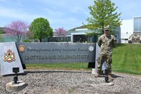 Pfc. Scott Gabner poses for a photogram outside the Unit Training Equipment Site at Fort Indiantown Gap, Pa., on April 29, 2025. Gabner, a graduate of the Keystone State Challenge Academy, is a wheeled vehicle mechanic with Delta Co., 128th Brigade Support Battalion, 2nd Infantry Brigade Combat Team and works full-time as a mechanic at UTES. (Pennsylvania National Guard photo by Brad Rhen)