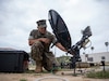 U.S. Marine Corps Lance Cpl. Ricardo Ramirez, a radio operator assigned to the 15th Marine Expeditionary Unit, I Marine Expeditionary Force, operates a multi-mission terminal (MMT)   during a command post exercise on Marine Corps Base Camp Pendleton, April 23, 2025.