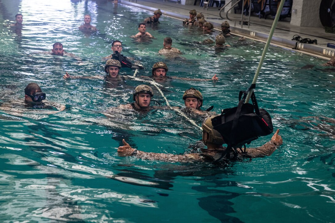 U.S. Marines with Maritime Special Purpose Force, 22nd Marine Expeditionary Unit, conduct a wet rehearsal of Special Patrol Insertion/Extraction (SPIE) training on Marine Corps Base Camp Lejeune, North Carolina, May 5, 2025. Wet and dry SPIE training enhances MSPF’s ability to maneuver forces from land or open ocean, granting the 22nd MEU flexibility when inserting or extracting forces from complex terrain. (U.S. Marine Corps Photo by Sgt. Nathan Mitchell)