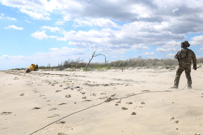 Soldiers with the Pennsylvania National Guard’s 28th Expeditionary Combat Aviation Brigade crewed a CH-47 Chinook helicopter to assist the U.S. Coast Guard by transporting three buoys May 7 in the Chesapeake Bay and Delaware Bay. During the winter, buoys are often displaced and washed up on beaches that are inaccessible to Coast Guard boats. (U.S. Army National Guard photo by Sgt. 1st Class Zane Craig)