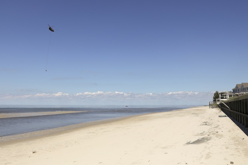 Soldiers with the Pennsylvania National Guard’s 28th Expeditionary Combat Aviation Brigade crewed a CH-47 Chinook helicopter to assist the U.S. Coast Guard by transporting three buoys May 7 in the Chesapeake Bay and Delaware Bay. During the winter, buoys are often displaced and washed up on beaches that are inaccessible to Coast Guard boats. (U.S. Army National Guard photo by Sgt. 1st Class Zane Craig)