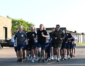 U.S. Air Force Airmen from the 133rd Airlift Wing run in the aerial port memorial run in St. Paul, Minn, May 4, 2025.