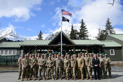 Members from the 138th Fighter Wing and the Seward Military Resort take a group photo during a deployment for training in Seward, Alaska, April 19, 2025. During the DFT, the 138th CES completed vital training while enhancing the resort’s ability to provide support to service members and their families. (Oklahoma Air National Guard Photo by Master Sgt. Rebecca Imwalle)
