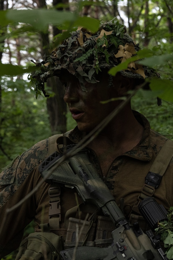 U.S. Marine Corps Cpl. Charles Biggers, an infantry rifleman with 2nd Battalion, 23rd Marines forward deployed with 4th Marine Regiment, 3d Marine Division as part of the Unit Deployment Program, patrols during Korea Viper 25.4 at Pohang, South Korea, May 5, 2025. Korea Viper is a recurring exercise series that demonstrates the Republic of Korea and U.S. Marine Corps' ability to respond decisively in the region as a singular, unified force while strengthening relationships and trust between the two allies. Biggers is a native of Utah. (U.S. Marine Corps photo by Lance Cpl. Tucker Mocan)