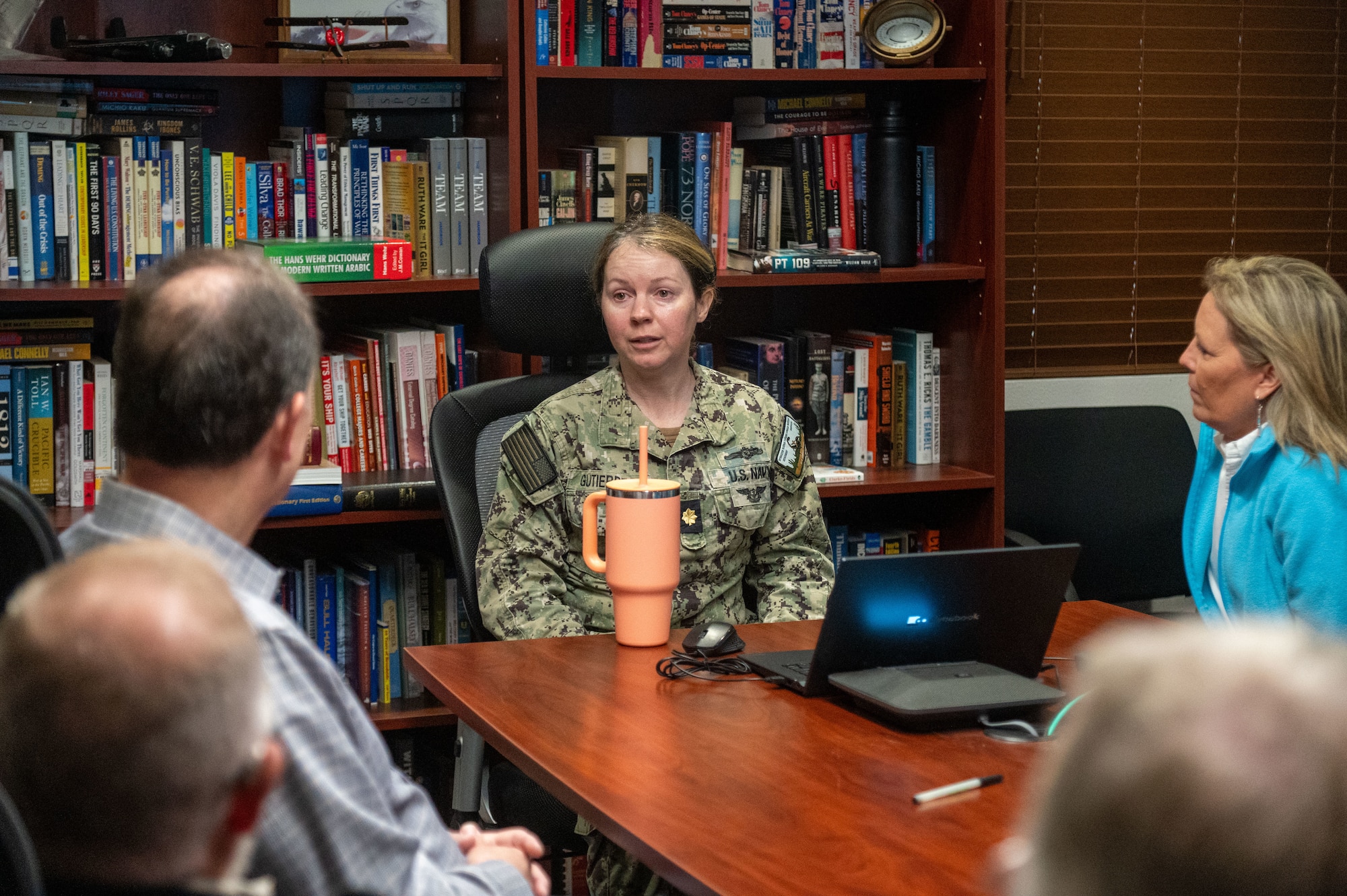 U.S. Navy Lt. Cmdr. Yolanda Gutierrez, Information Warfare Training Command Monterey Detachment Goodfellow commander, briefs the 2024–2025 class of 17th Training Wing honorary commanders on naval training and culture at Goodfellow Air Force Base, Texas, May 8, 2025. The IWTCM’s mission is to deliver trained information warfare professionals to the Navy and joint services, enabling optimal performance of information warfare across the full spectrum of military operations. (U.S. Air Force photo by Airman 1st Class James Salellas)