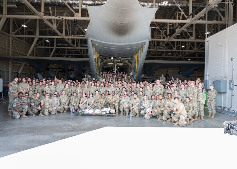 The participants of the Tactical Combat Casualty Care skills day event, pose for a group photo at Joint Base San Antonio-Lackland, Texas, May 9, 2025.
