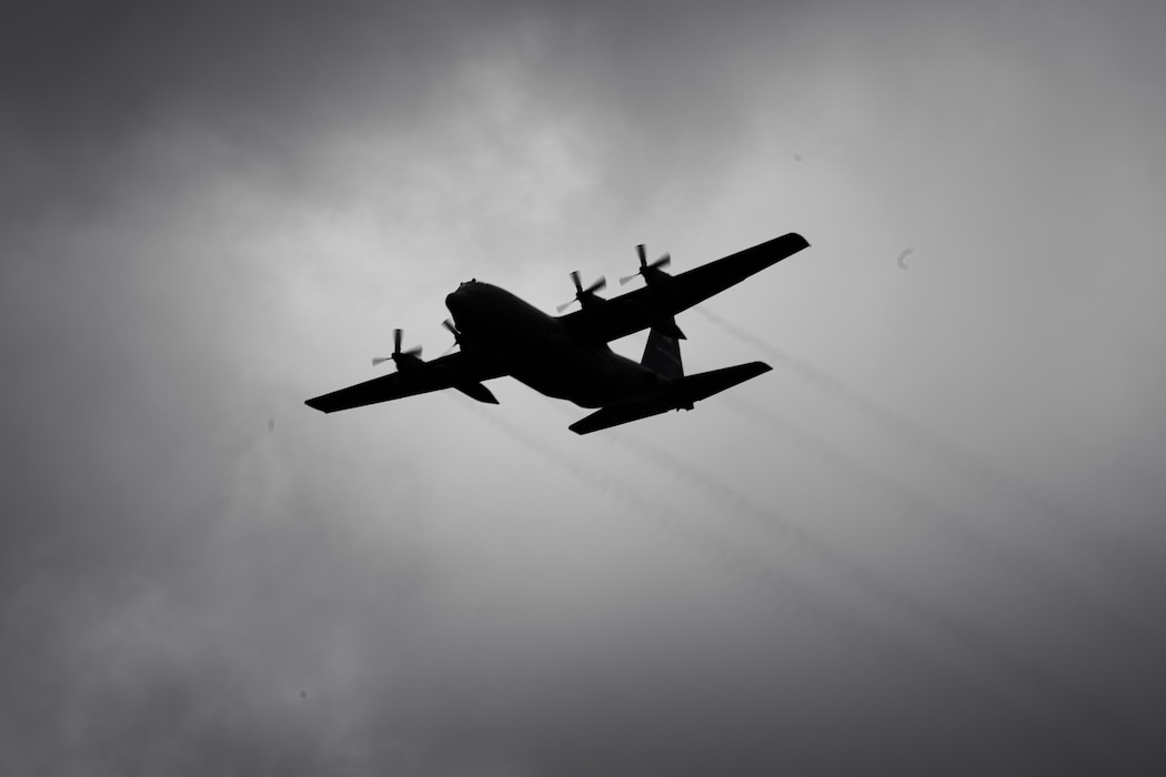 A C-130 Hercules assigned to the 103rd Airlift Wing, circles above former Loring Air Force Base, Limestone Me, May 3, 2025. The 103rd was part of a multi-organizational exercise involving players from various units, demonstrating Agile Combat Employment in remote areas.