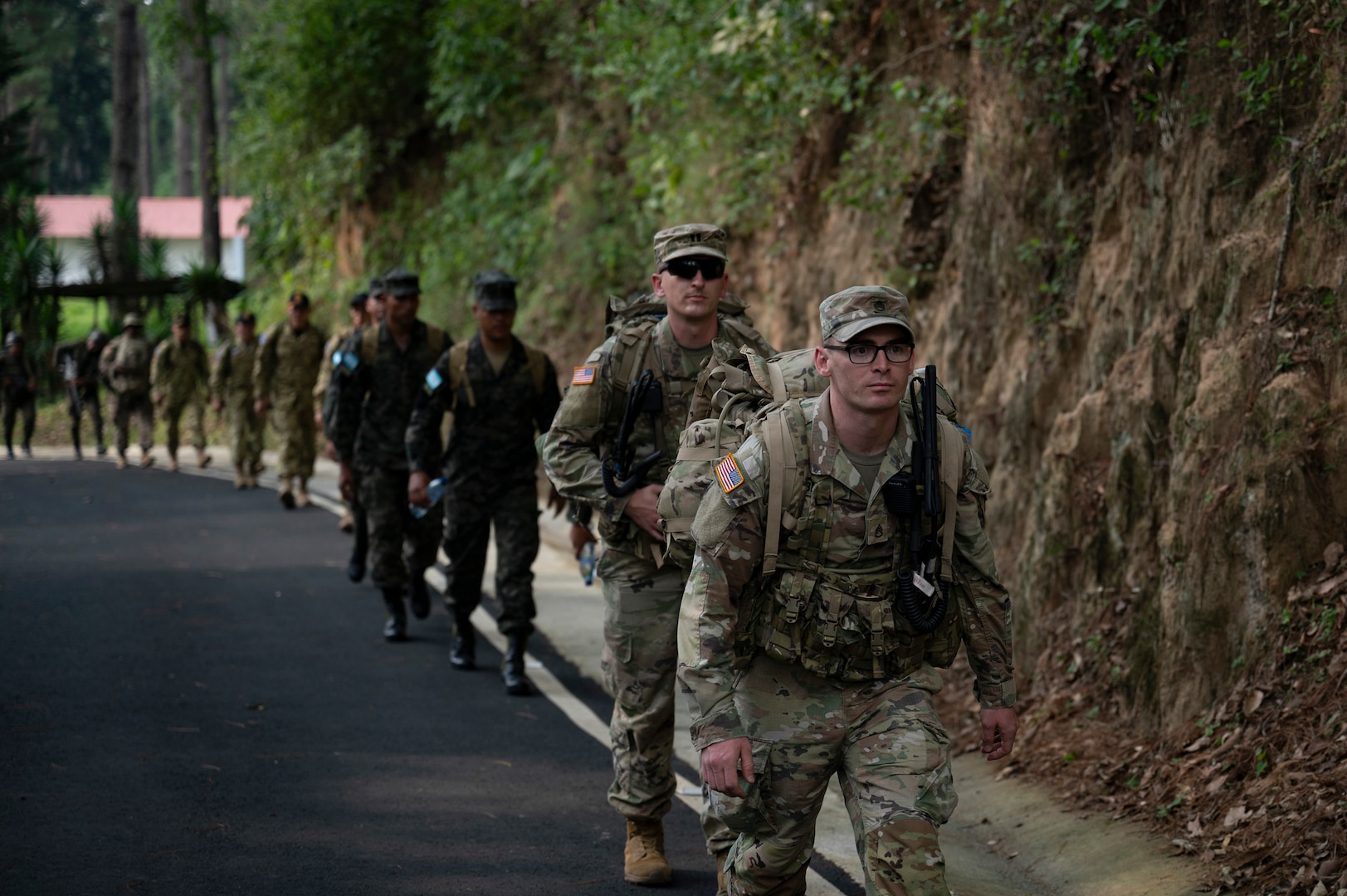 U.S. and Honduran infantrymen ruck at Mariscal Zavala, Guatemala, May 12, 2025. As part of CENTAM Guardian 25, infantrymen from Honduras, U.S., El Salvador and Guatemala, rucked to their exercise site where they will execute specific survival tactics in the Guatemalan jungles.