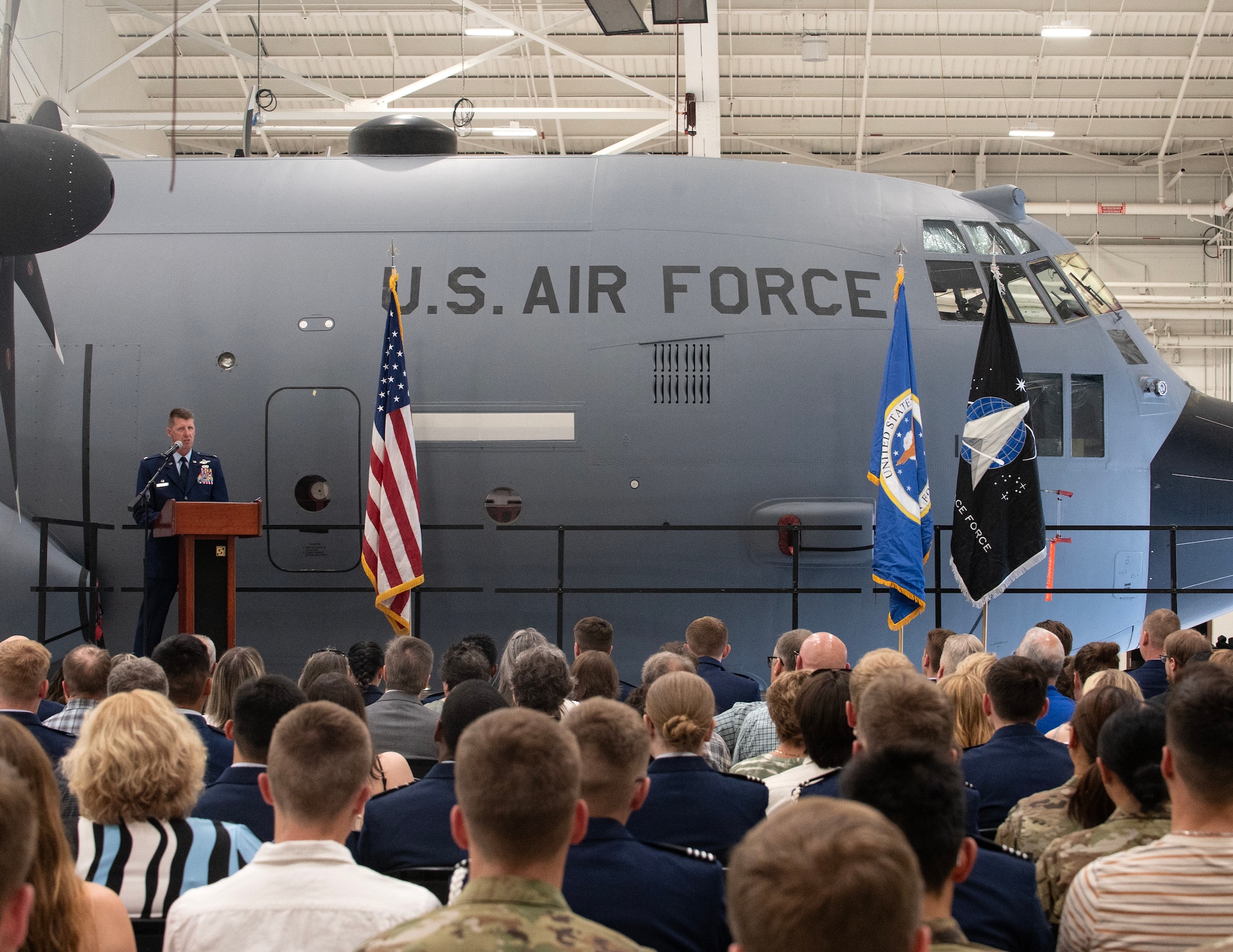 U.S. Air Force Col. Jesse Carlson, commander of the 133rd Airlift Wing, provides remarks in St. Paul, Minn., May 13, 2025.