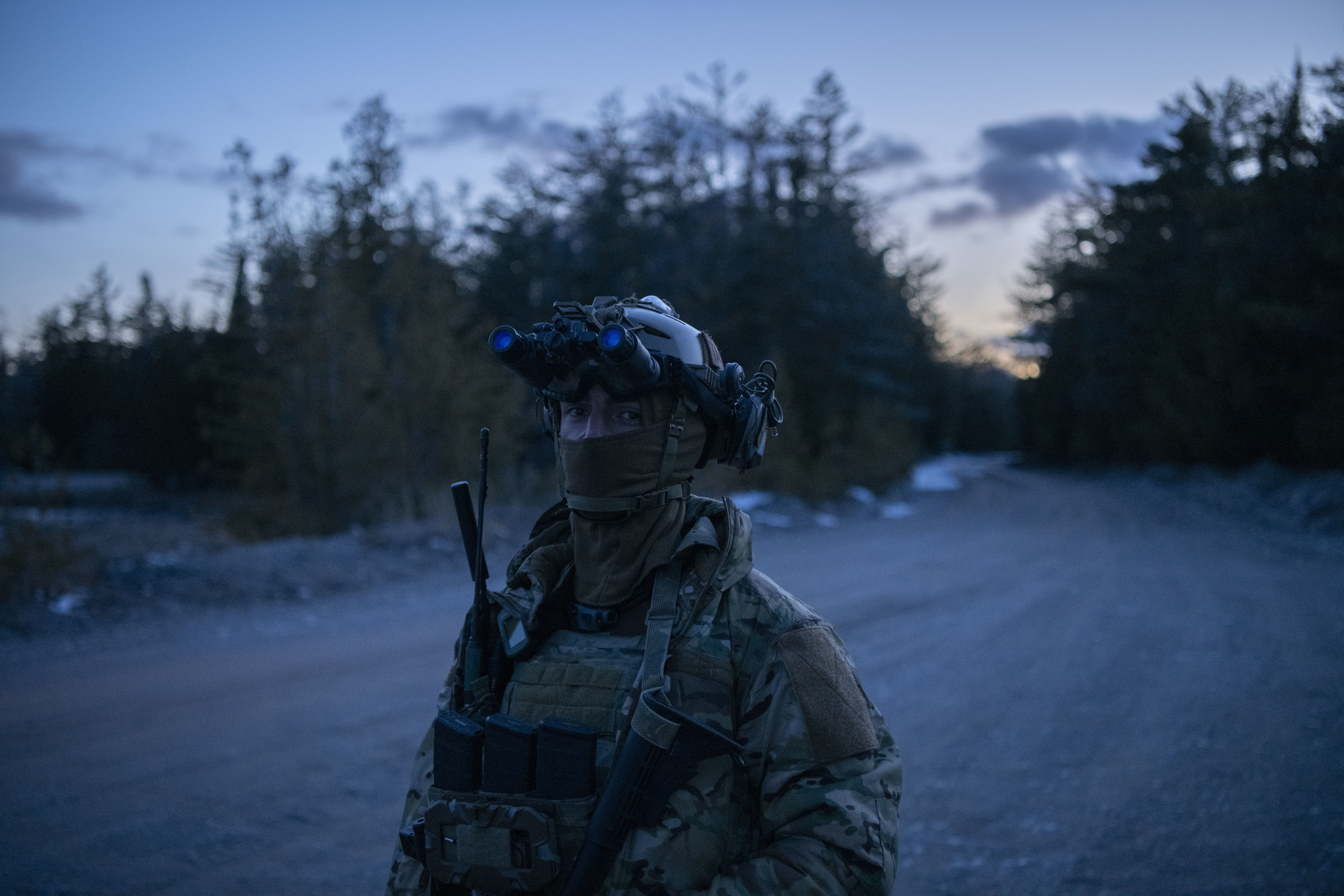 A 3d Air Support Operations Group Tactical Air Control Party (TACP) Airman stands at the Alpena Combat Readiness Training Center, Apr. 8, 2025, during exercise Capri Sun. Throughout the exercise, blue force TACP and Survival, Evasion, Resistance, and Escape specialists conducted surveillance and targeting operations while being hunted by 820th Base Defense Group opposing forces. (U.S. Air Force photo by Capt. Christian Little)