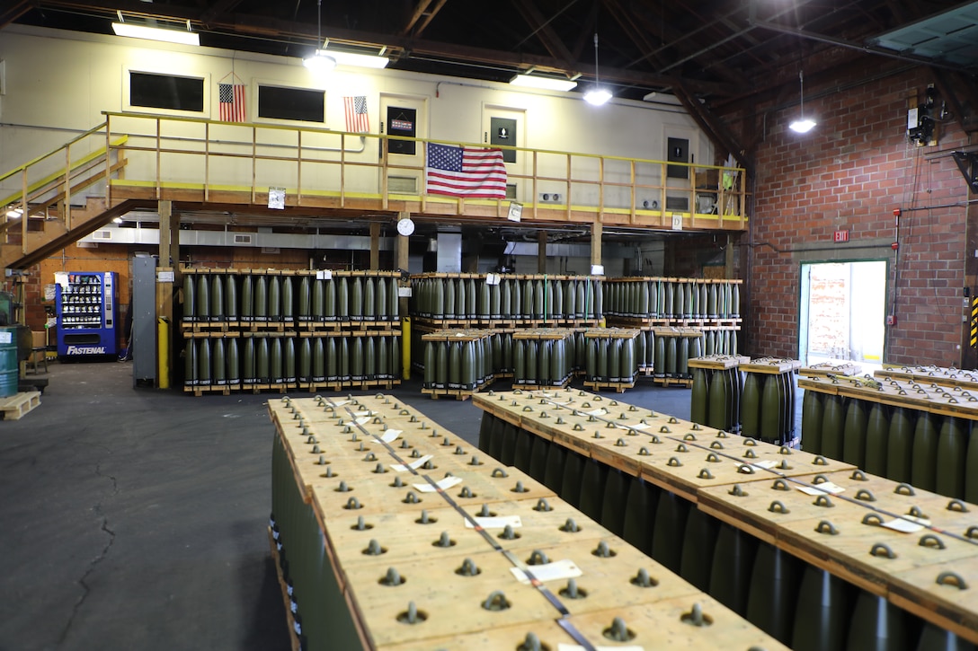 Stacks of shell casings stored at an ammunition plant.