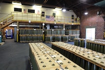 Stacks of shell casings stored at an ammunition plant.