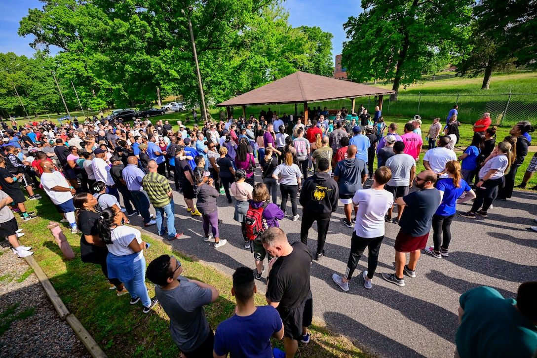People gather and listen to a speech