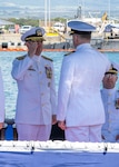 JOINT BASE PEARL HARBOR-HICKAM, Hawaii (May 9, 2025) - Rear Adm. Chris Cavanaugh, commander, Submarine Force, U.S. Pacific Fleet, receives report of relief from Capt. Chris Hedrick, incoming commander, Submarine Squadron (CSS) 1, aboard the Virginia-class fast-attack submarine USS Vermont (SSN 792), during the change of command ceremony for CSS-1, May 9, 2025. CSS-1 is composed of six Virginia-class fast-attack submarines, which are capable of supporting various missions, including anti-submarine warfare, anti-surface ship warfare, strike warfare, special operations forces support, and intelligence, surveillance, and reconnaissance. (U.S. Navy photo by Mass Communication Specialist 1st Class Scott Barnes)