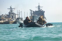 U.S. Marines with Baker Company, Battalion Landing Team 1st Battalion, 7th Marine Regiment, 31st Marine Expeditionary Unit, conduct paddling and broaching drills during small boat refresher course at White Beach Naval Facility, Okinawa, Japan, May 3, 2025.