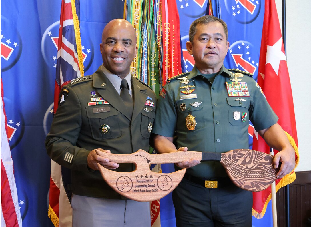 U.S. Army Gen. Ronald Clark (left), Commanding General of USARPAC, and Gen. Maruli Simanjuntak (right), Chief of Staff of the Indonesian Army, participate in a gift exchange during the 2025 Land Forces Pacific Symposium and Exposition (LANPAC), Honolulu, Hawaii, May 14, 2025