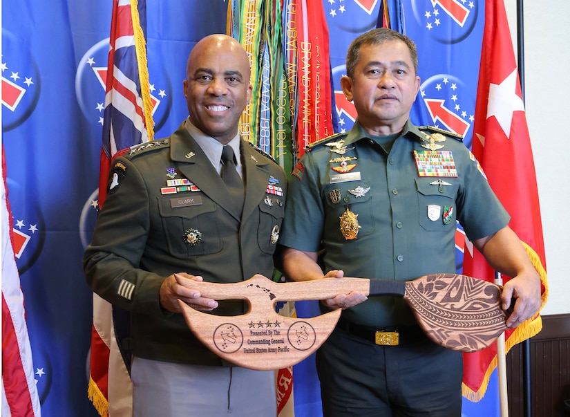 U.S. Army Gen. Ronald Clark (left), Commanding General of USARPAC, and Gen. Maruli Simanjuntak (right), Chief of Staff of the Indonesian Army, participate in a gift exchange during the 2025 Land Forces Pacific Symposium and Exposition (LANPAC), Honolulu, Hawaii, May 14, 2025