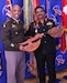U.S. Army Gen. Ronald Clark (left), Commanding General of USARPAC, and Lt Gen. Lasantha Rodrigo, Commander of the Sri Lanka Army, participate in a gift exchange during the 2025 Land Forces Pacific Symposium and Exposition (LANPAC), Honolulu, Hawaii, May 13, 2025.
