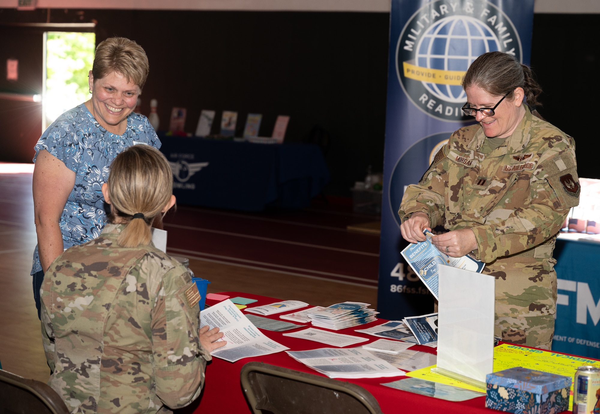 Participants of the fifth annual Military Spouse Appreciation Day event prepare for spouses to arrive at Ramstein Air Base, Germany, May 9, 2025. Military Spouse Appreciation Day first began in 1984 to show appreciation for military spouses. (U.S. Air Force photo by Senior Airman Jared Lovett)