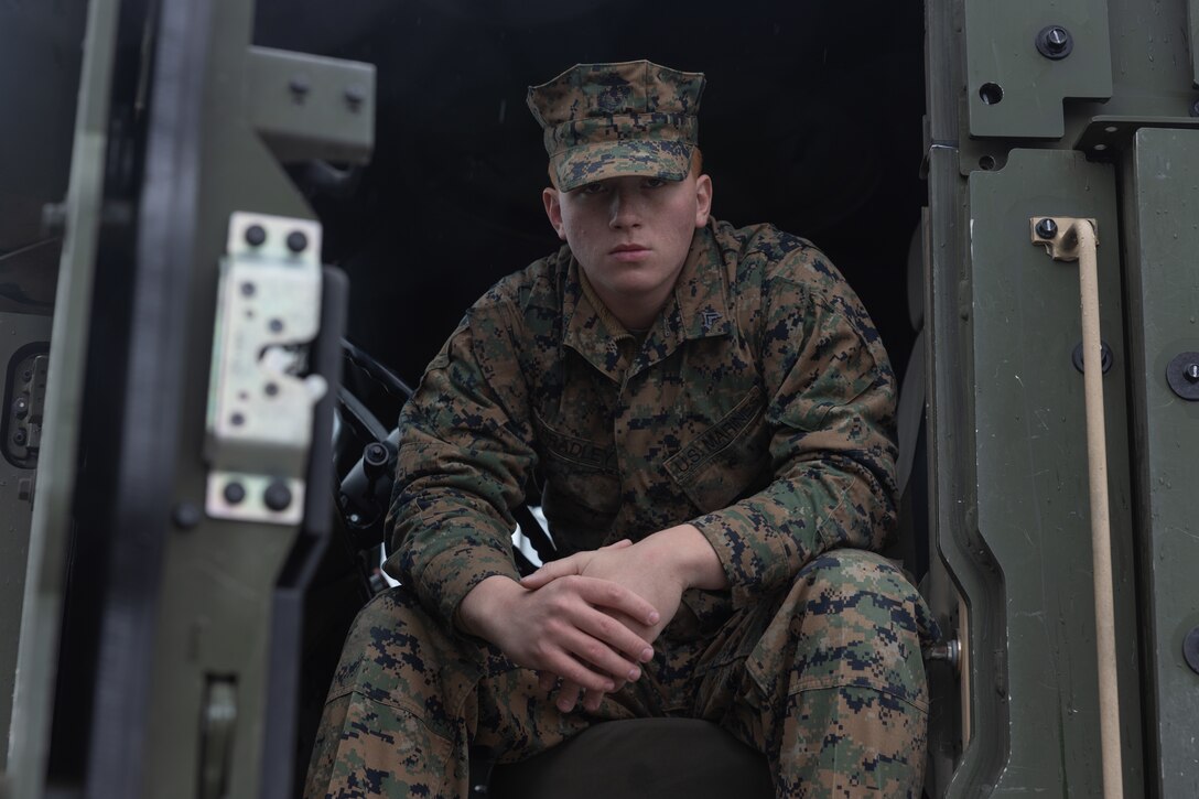 U.S. Marine Corps Cpl. Austin Bradley, the motor transport operations noncommissioned officer with Combat Logistics Battalion 22, Combat Logistics Regiment 27, 2nd Marine Logistics Group, and a native of Riverview, Florida, poses for a photo in Setermoen, Norway, May 1, 2025. Bradley was selected as 2nd MLG Warrior of the Week for exceeding expectations while filling the billet of a staff non-commissioned officer and ensuring that there have been no missing pieces while serving as platoon sergeant. According to his leadership, Bradley constantly performs to the level of a staff non- commissioned officer and his leadership and attention to detail prepared more than 20 Marines to administratively and physically deploy to Exercise Swift Response 25 in Norway. (U.S. Marine Corps photo by Lance Cpl. Franco Lewis)