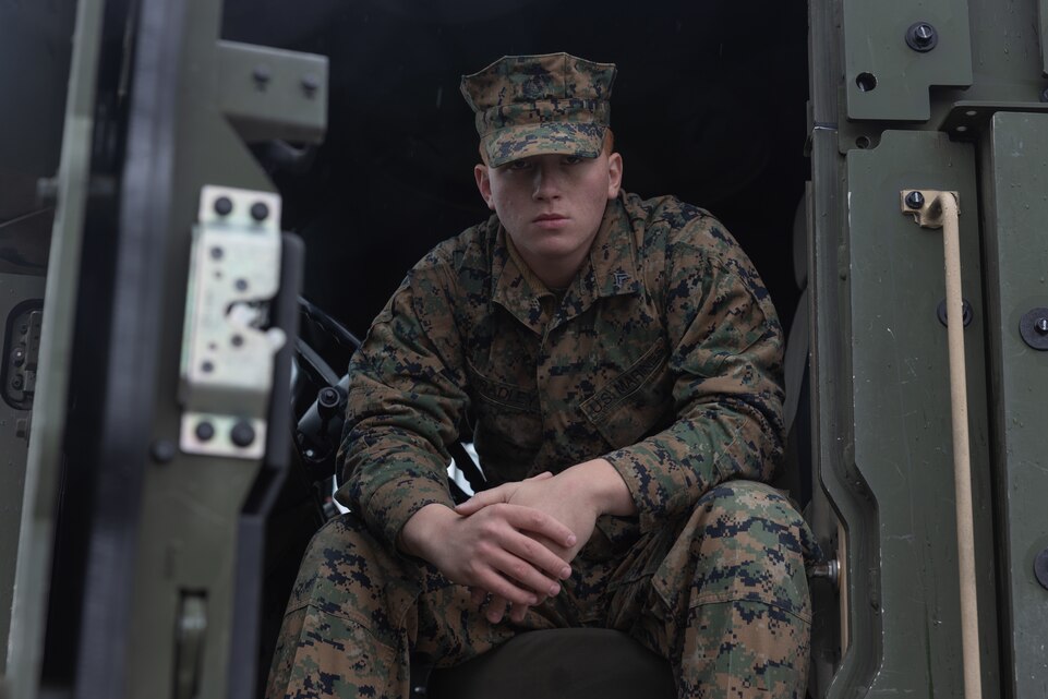 U.S. Marine Corps Cpl. Austin Bradley, the motor transport operations noncommissioned officer with Combat Logistics Battalion 22, Combat Logistics Regiment 27, 2nd Marine Logistics Group, and a native of Riverview, Florida, poses for a photo in Setermoen, Norway, May 1, 2025. Bradley was selected as 2nd MLG Warrior of the Week for exceeding expectations while filling the billet of a staff non-commissioned officer and ensuring that there have been no missing pieces while serving as platoon sergeant. According to his leadership, Bradley constantly performs to the level of a staff non- commissioned officer and his leadership and attention to detail prepared more than 20 Marines to administratively and physically deploy to Exercise Swift Response 25 in Norway. (U.S. Marine Corps photo by Lance Cpl. Franco Lewis)