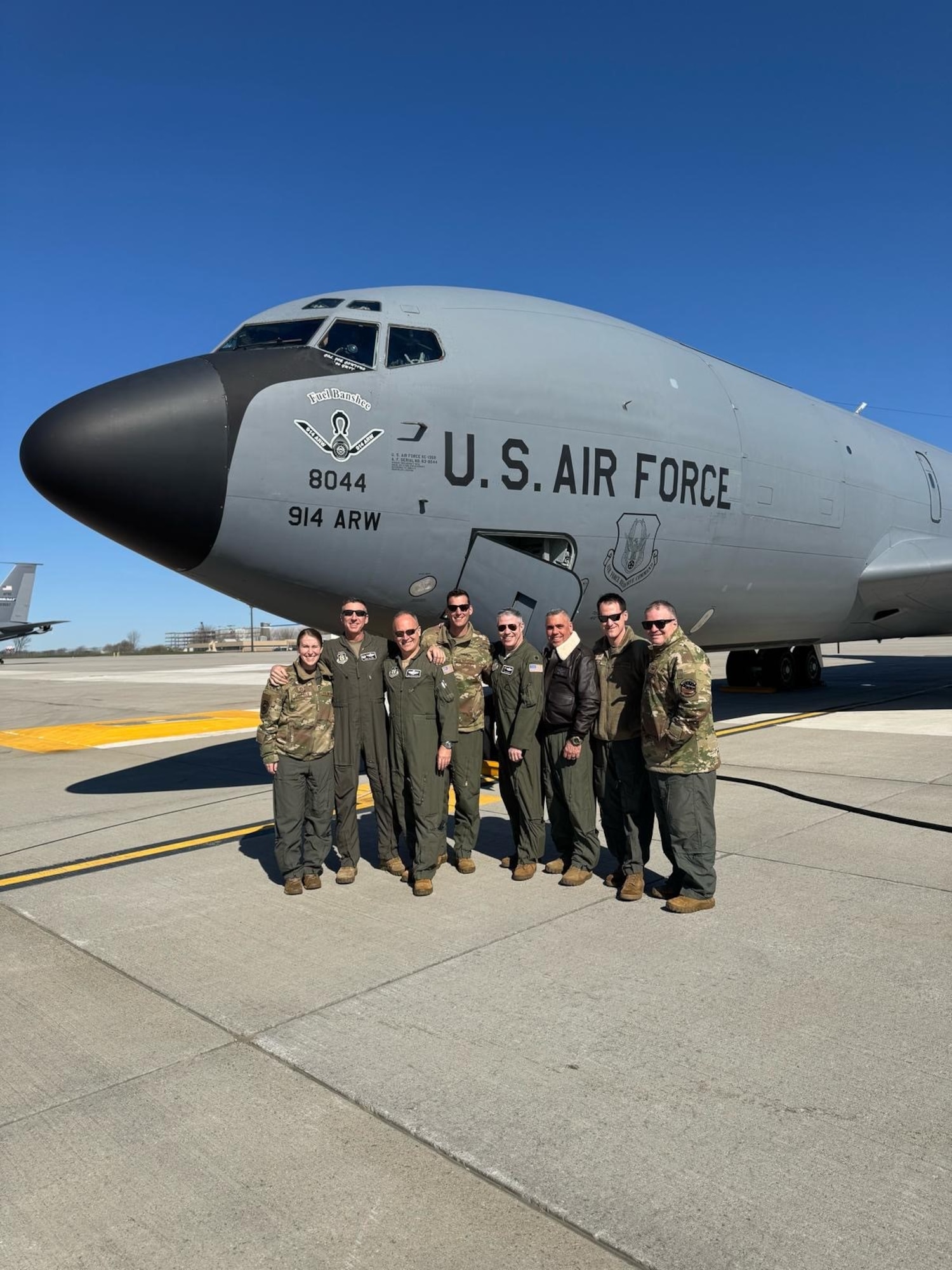 Lt. Col. CJ Pfeil celebrates his final flight in April after nearly 30 years of service standing outside of a KC-135