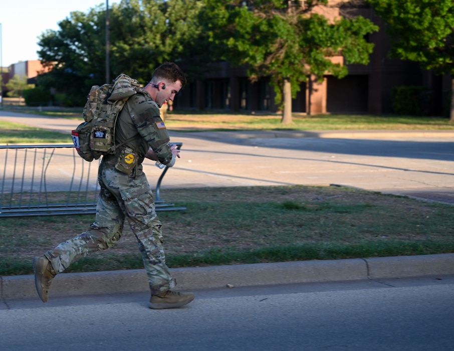 A U.S. Army soldier runs towards the halfway checkpoint during the 2025 annual Norwegian Foot March at Goodfellow Air Force Base, Texas, May 3, 2025. This event was open to the public, welcoming civilians and service members from all military branches to compete and offering active-duty participants the opportunity to qualify for the Norwegian Foot March badge. (U.S. Air Force photo Senior Airman Evelyn J. D’Errico)