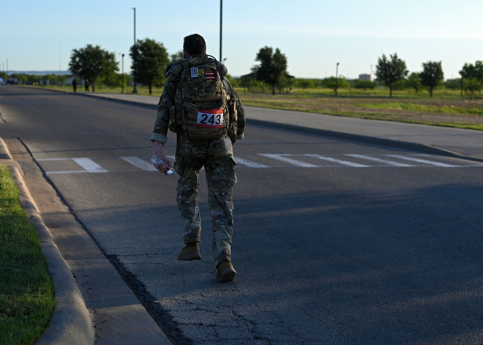 Competitors advance during the 2025 annual Norwegian Foot March at Goodfellow Air Force Base, Texas, May 3, 2025. Originating in 1915 as an endurance test for Norwegian armed forces, the 18.6-mile march allows participants to test their cardiovascular endurance and build esprit de corps. (U.S. Air Force photo by Senior Airman Evelyn J. D’Errico)