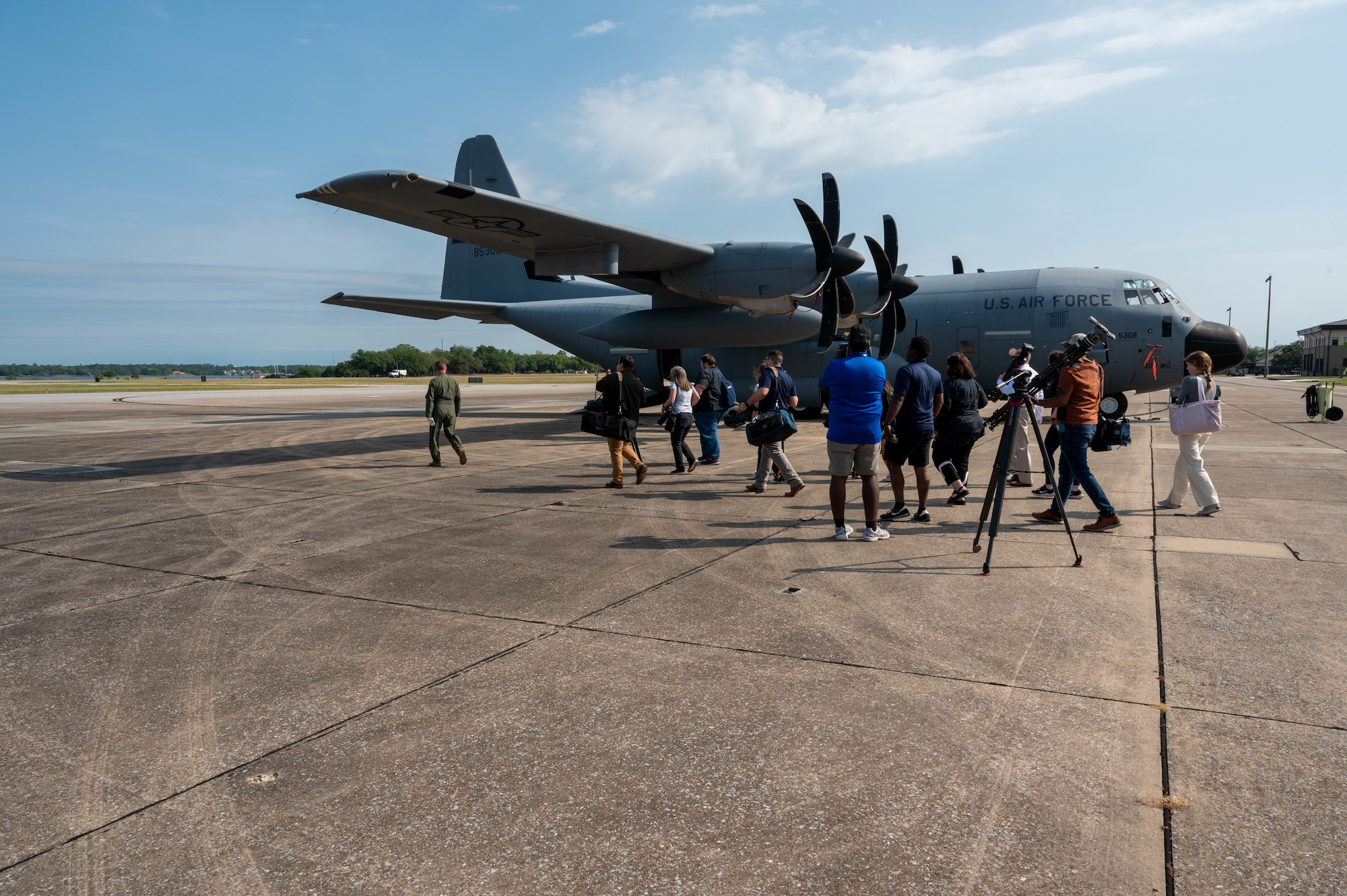 WC-130J aircraft on the flightline and media