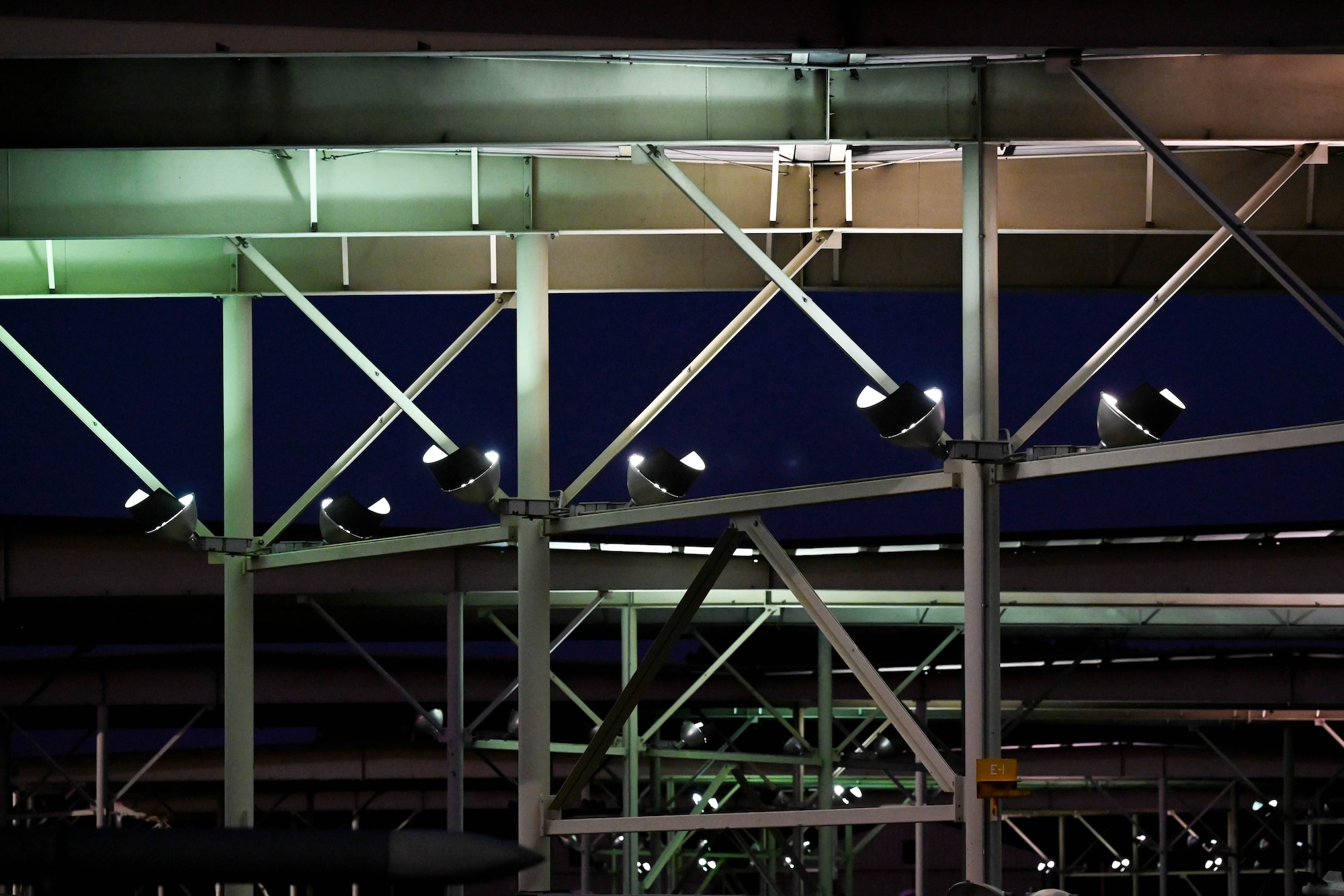 Sun shade lights illuminate the flightline at night at Shaw Air Force Base, S.C., Dec. 12, 2024. Sun shade lights allow personnel to perform critical maintenance at all times of the day. (U.S. Air Force photo by Senior Airman Steven Cardo)