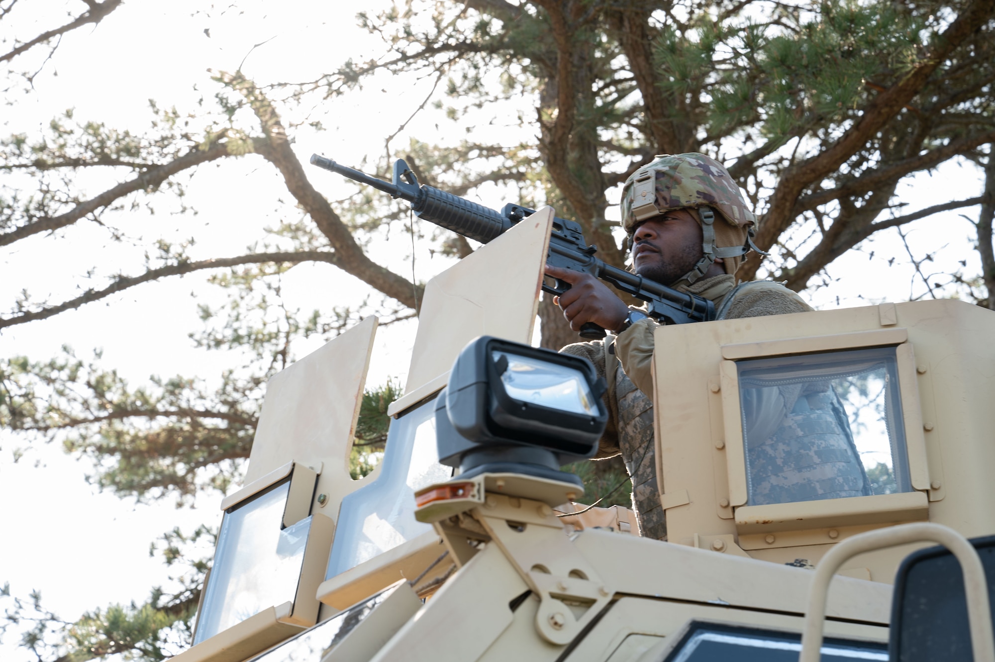 Airman sits in a tactical vehicle.