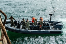 Students and instructors approach a merchant training vessel during a Senegalese led Visit, Board, Search, and Seizure (VBSS) training exercise during Obangame Express. Obangame Express is one of three regional maritime exercises led by U.S. Sixth Fleet as part of a comprehensive strategy to provide collaborative opportunities to African forces and international partners to address maritime security concerns.